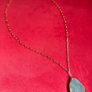 Elegant Gold Necklace with Blue Pendant